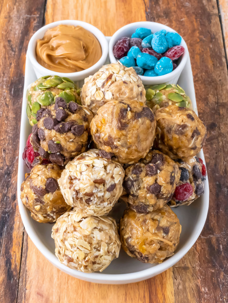 A plate of protein balls with various toppings.