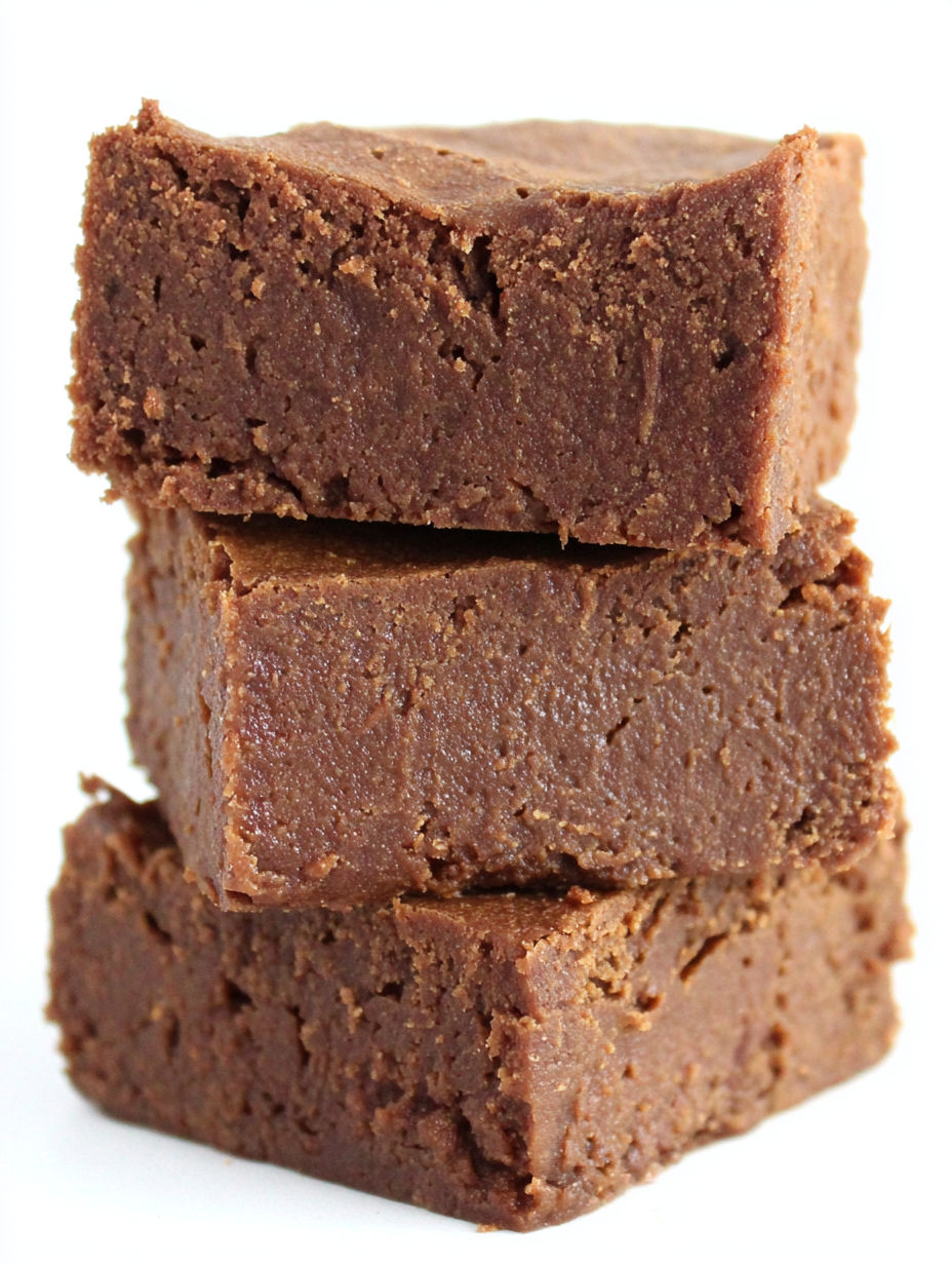 Three brownies stacked on top of each other.