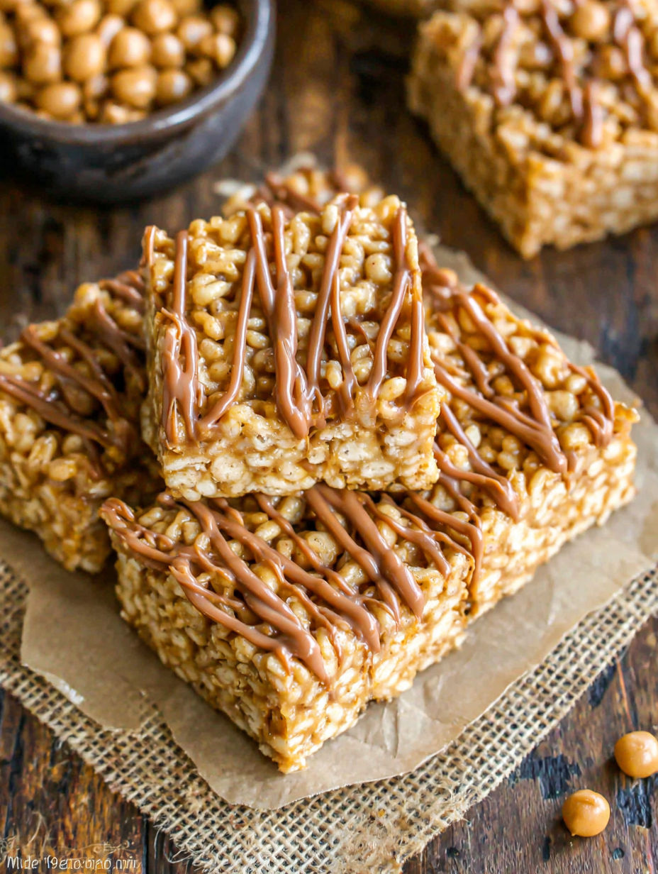 A close up of a peanut butter and rice krispie treat.