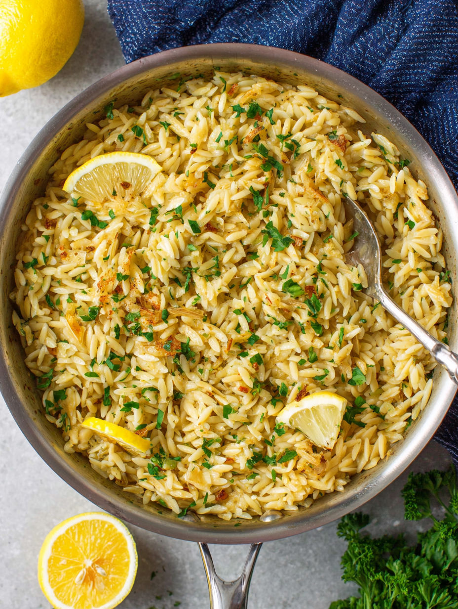 A bowl of creamy lemon orzo.
