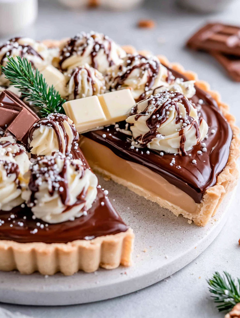 A slice of chocolate and whipped cream tart.