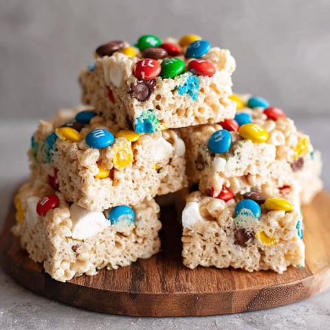 A stack of M&M Rice Krispie treats.