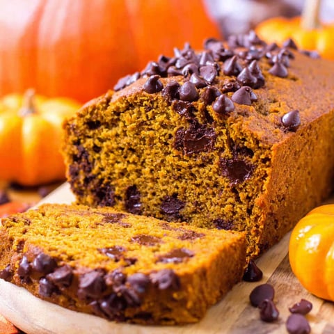 A slice of pumpkin bread with chocolate chips.