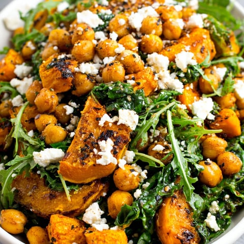 A bowl of roasted pumpkin chickpea salad.