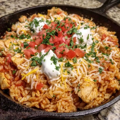 A delicious cheesy chicken taco rice dish.