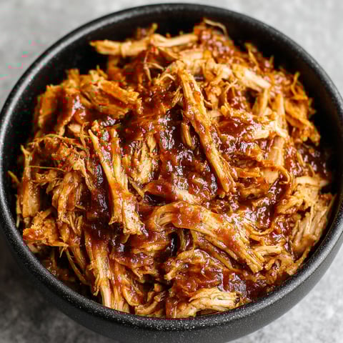 A bowl of slow cooker BBQ pulled pork.