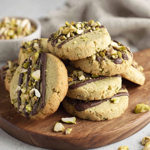 A stack of pistachio shortbread cookies.
